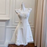 Niulatu A line Spaghetti Straps White Short Homecoming Dress Birthday Dresses With Bow HZ1110