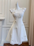 Niulatu A line Spaghetti Straps White Short Homecoming Dress Birthday Dresses With Bow HZ1110