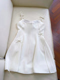 Niulatu A line Spaghetti Straps White Short Homecoming Dress Birthday Dresses With Bow HZ1110