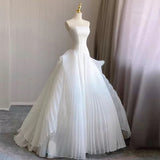 Niulatu Ball Gown Strapless Sleeveless White Tulle Wedding Dresses With Ruffles HZ1110