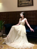 Niulatu A Line Spaghetti Straps Ivory Long Prom Dresses Evening Dress With Layers HZ1110