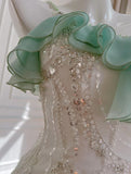 Niulatu Mint Green Spaghetti Straps Chiffon Ruffled Prom Dresses Shiny Beaded Sequined Backless Evening Dresses HZ1103