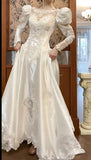 Niulatu White Scoop Neck Satin Long Sleeve Beaded Lace Applique Open Back Train Vintage Wedding Dress HZ1103
