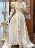 Niulatu White Scoop Neck Satin Long Sleeve Beaded Lace Applique Open Back Train Vintage Wedding Dress HZ1103