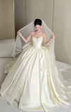 Niulatu Strapless Ball Gown Long Wedding Dresses Sleeveless Light Champagne Bride Gowns Satin Bridal Dresses HZ1026