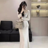 Korean Version Of Autumn And Winter New Square Long Sleeves Of Sleeves Fashion Sweater + High Waist Tight Half-Dress Knitted Two Sets Of Women HZ0108