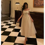 Niulatu A line Spaghetti Straps Ivory Satin Prom Dresses Evening Gowns SD1008