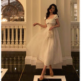 Niulatu A line Spaghetti Straps Ivory Satin Prom Dresses Evening Gowns SD1008