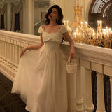 Niulatu A line Spaghetti Straps Ivory Satin Prom Dresses Evening Gowns SD1008