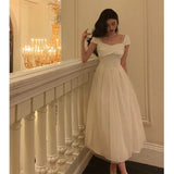 Niulatu A line Spaghetti Straps Ivory Satin Prom Dresses Evening Gowns SD1008